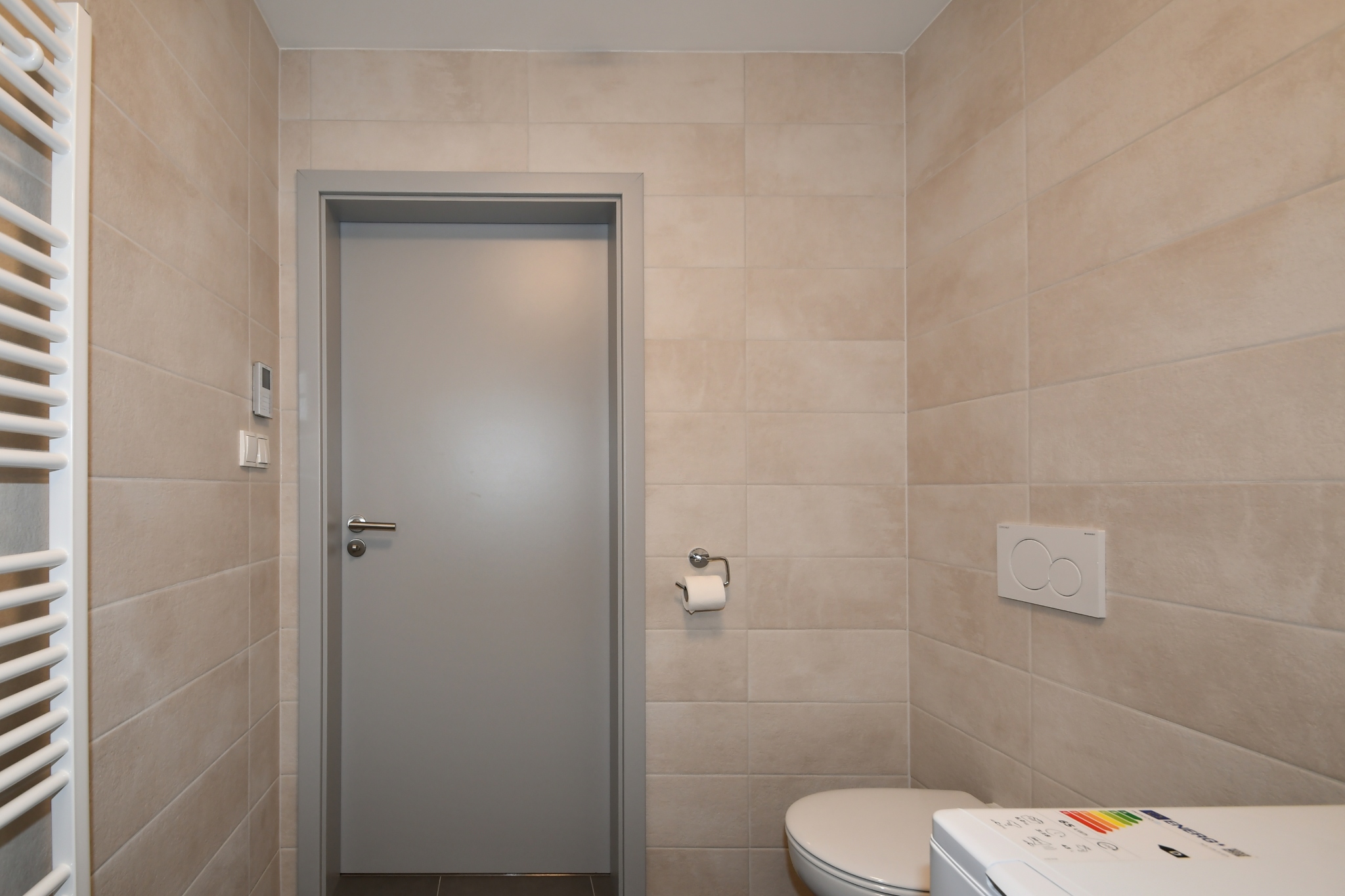 Koupelna s WC a se sprchovĂ˝m koutem.