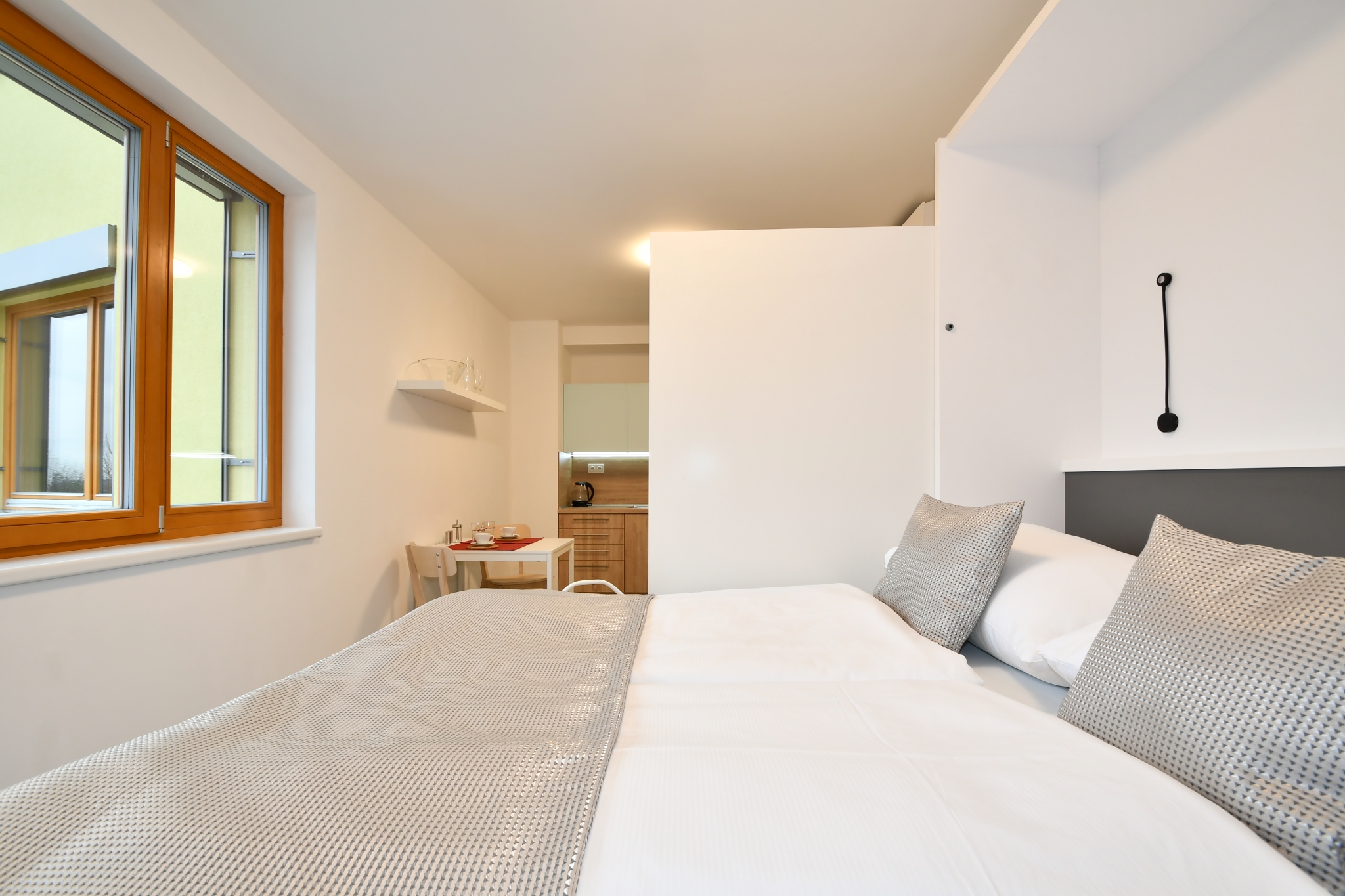 RozklĂĄdacĂ­ postel v rozloĹženĂŠm stavu.