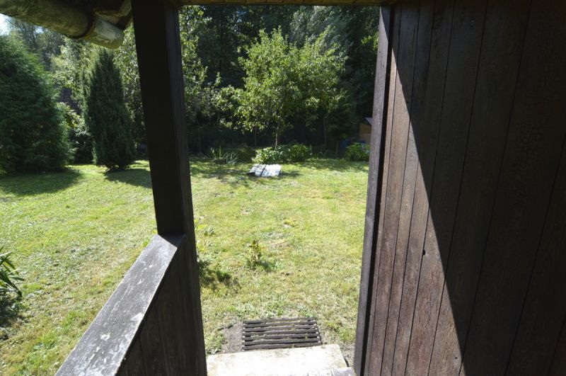 Zahrada u lesa se zahradním domkem v Týništi nad Orlicí.