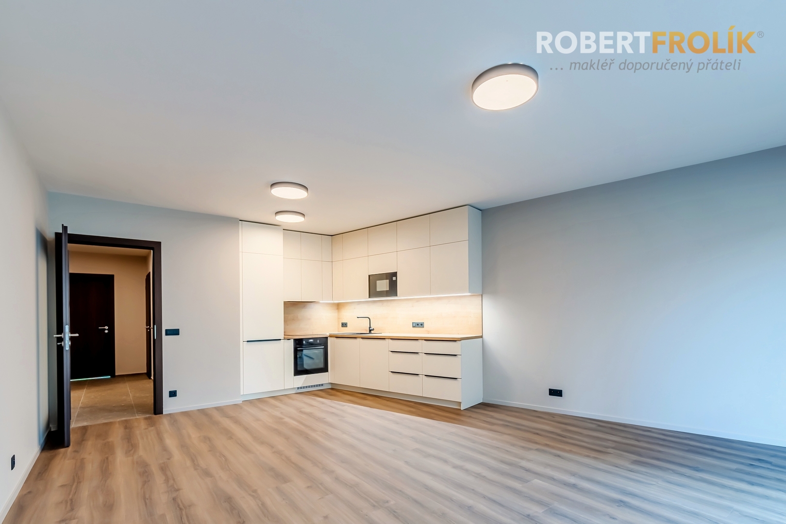 Nezařízený byt 3+kk s balkonem a garážovým stáním - Praha 5, Košíře - ul. Starokošířská - projekt Starokošířská Avenue - obývák s kuchyňským koutem