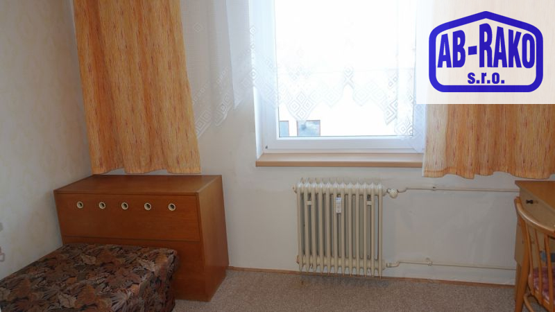 Byt 4+1 s balkonem a garáží ve zděné bytovce v N. Bystřici