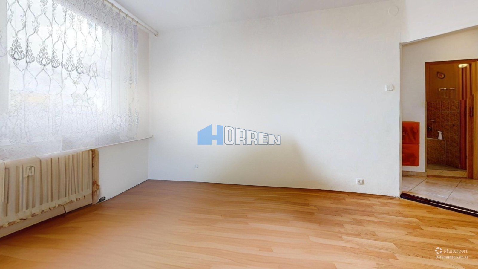 Byt-Holandska--Living-Room-Defurnished.jpg