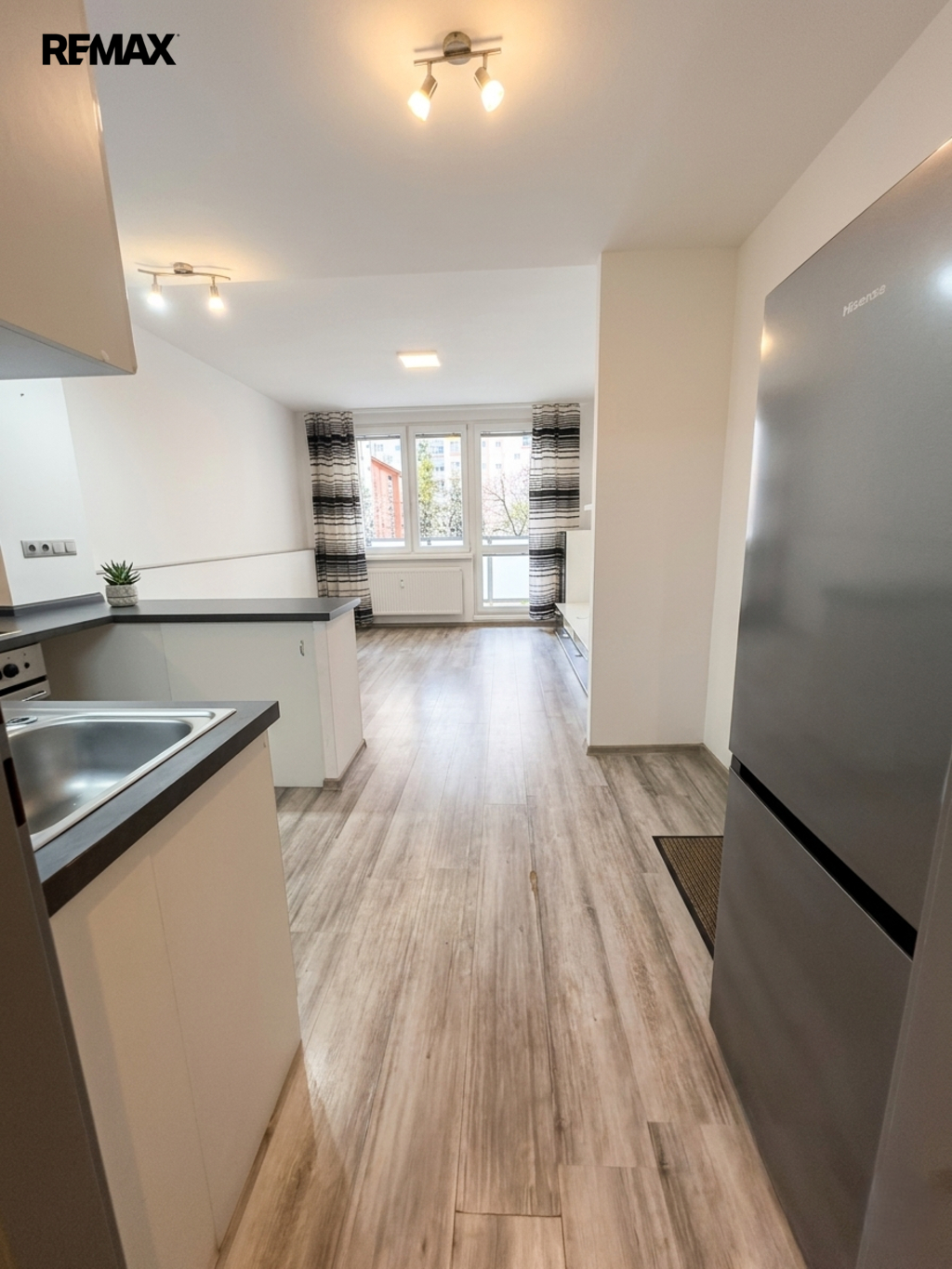 Obývací pokoj s kuchyňským koutem