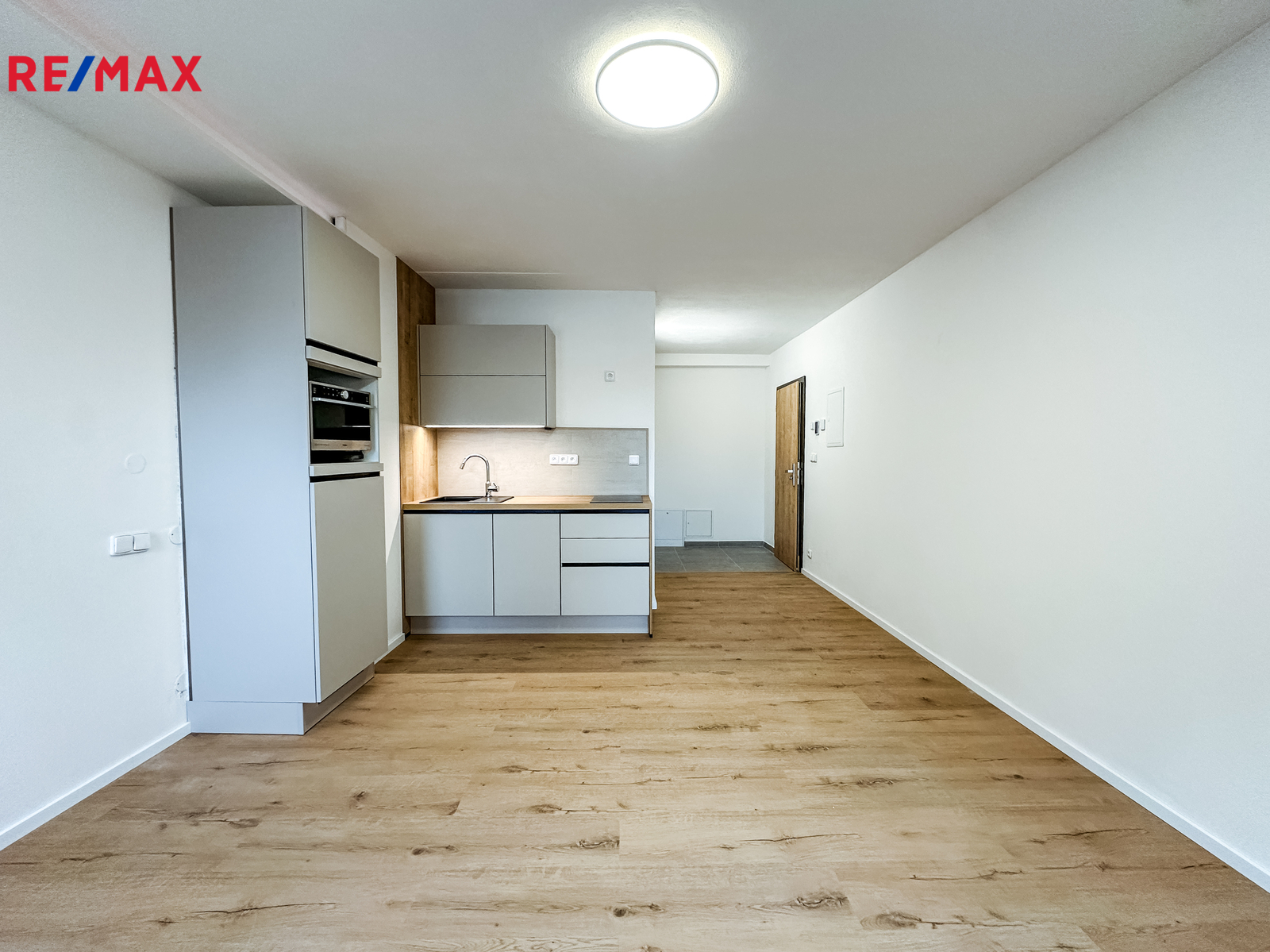 Pokoj s kuchyňským koutem