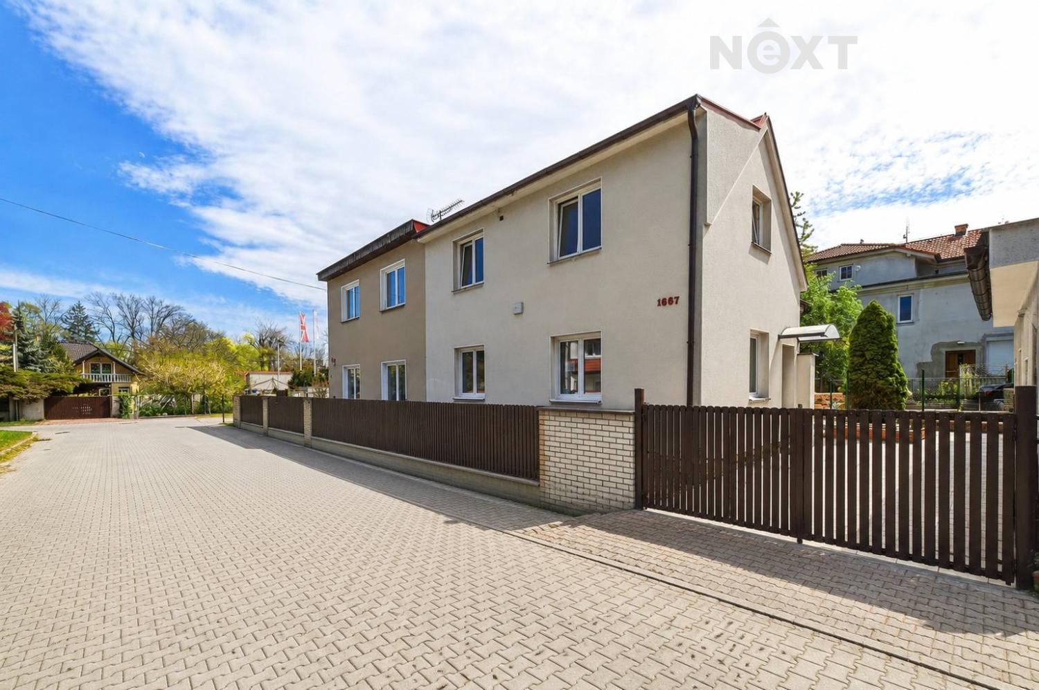 wide-exterior-daytime-street-view-of-a-residential