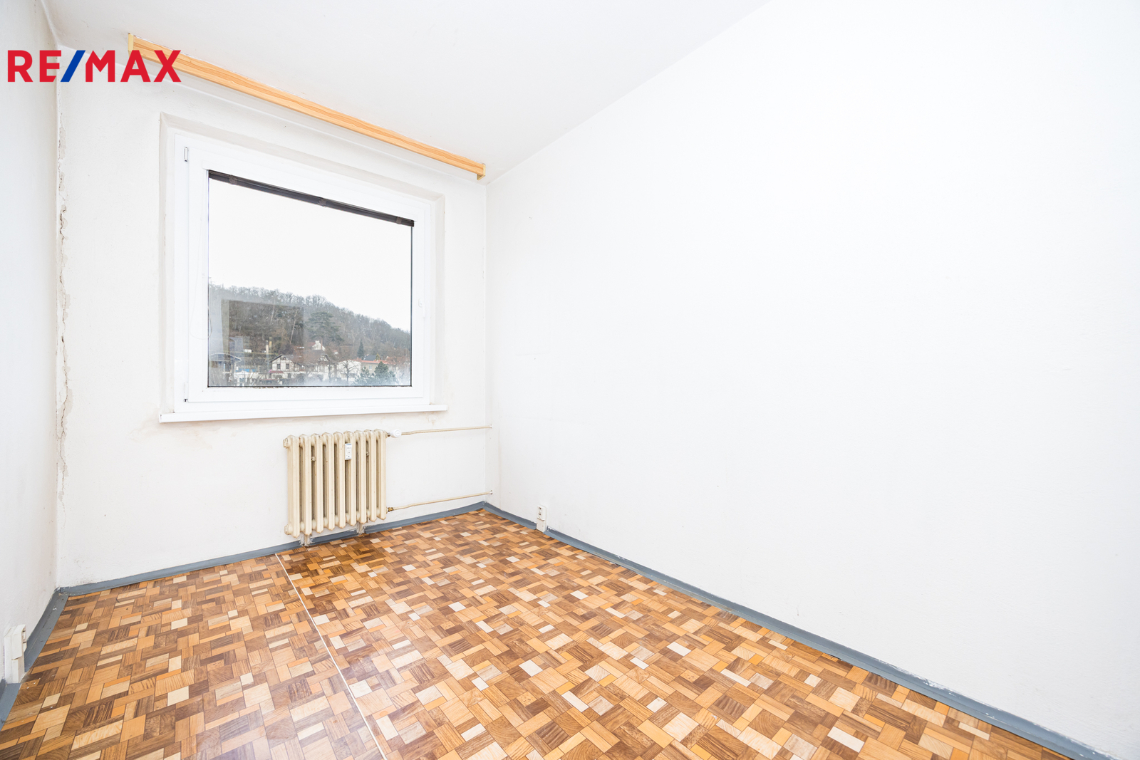 Pokoj se severovýchodní stranou