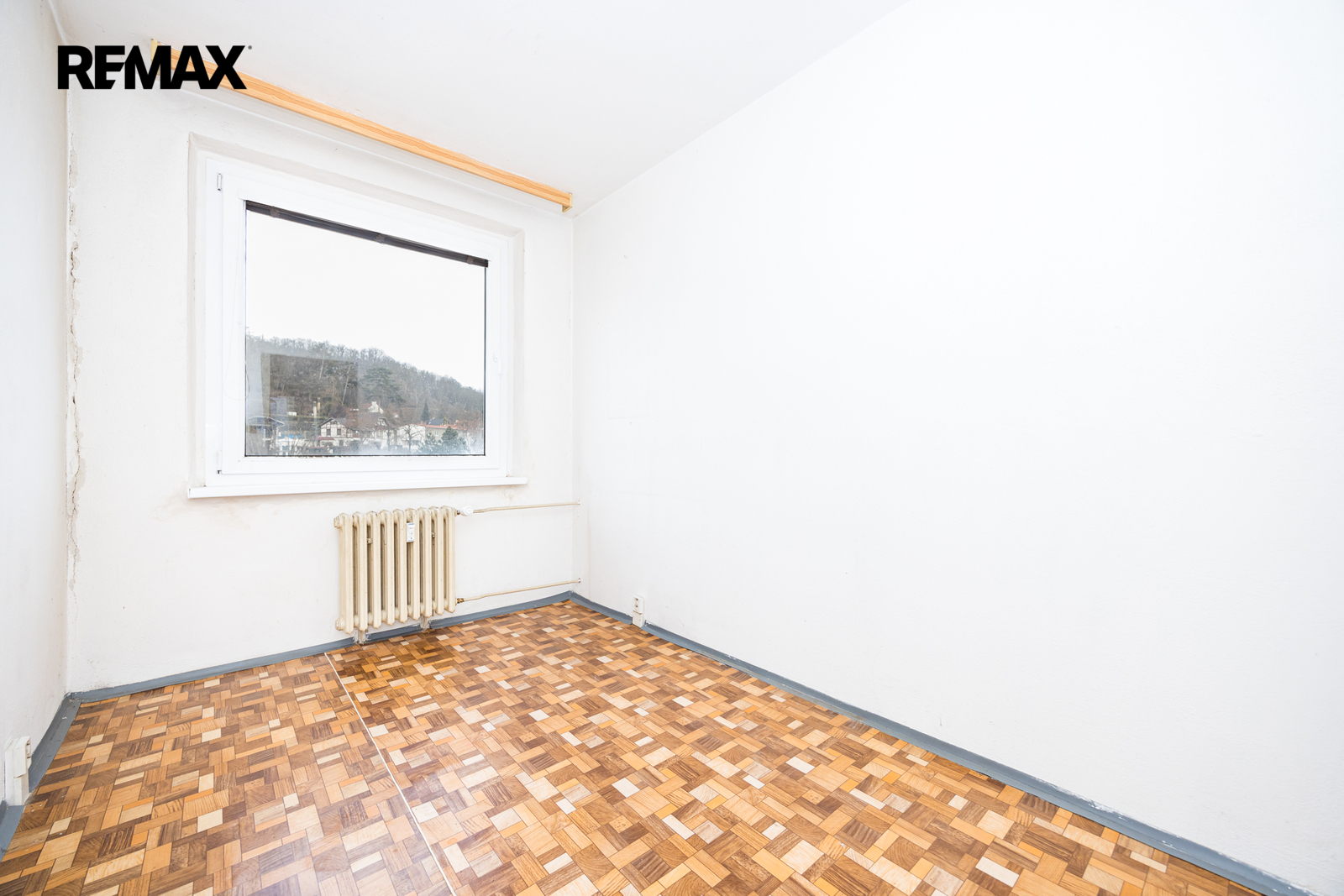 Pokoj se severovýchodní stranou