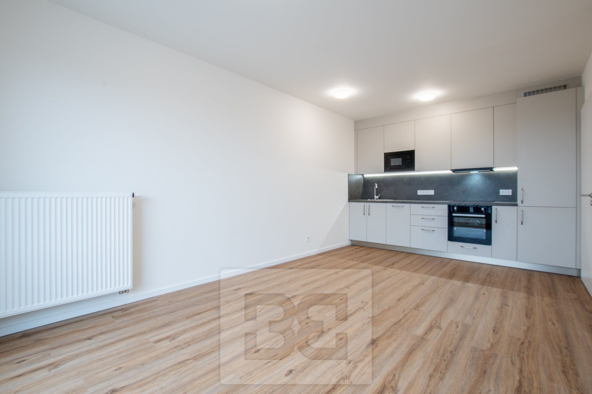 Obývací pokoj - pohled na kuchyň