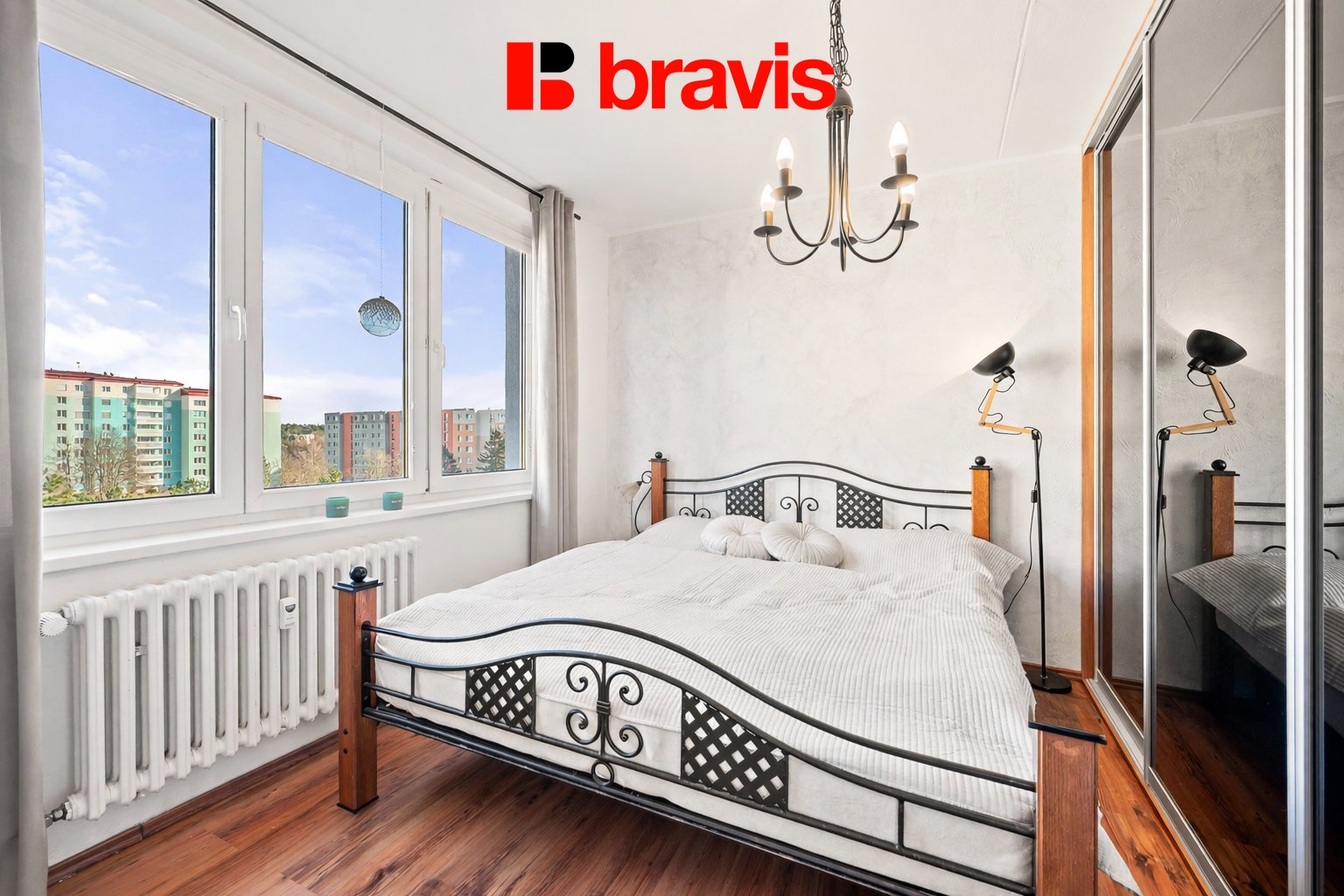 Modern bedroom with bright window view