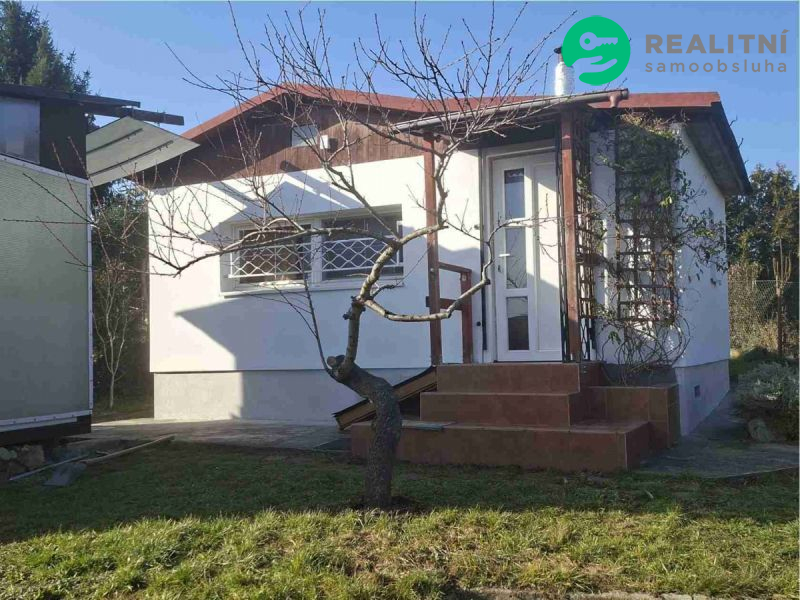 Zateplená, zděná  chata vhodná k celoročnimu bydleni-Praha 6