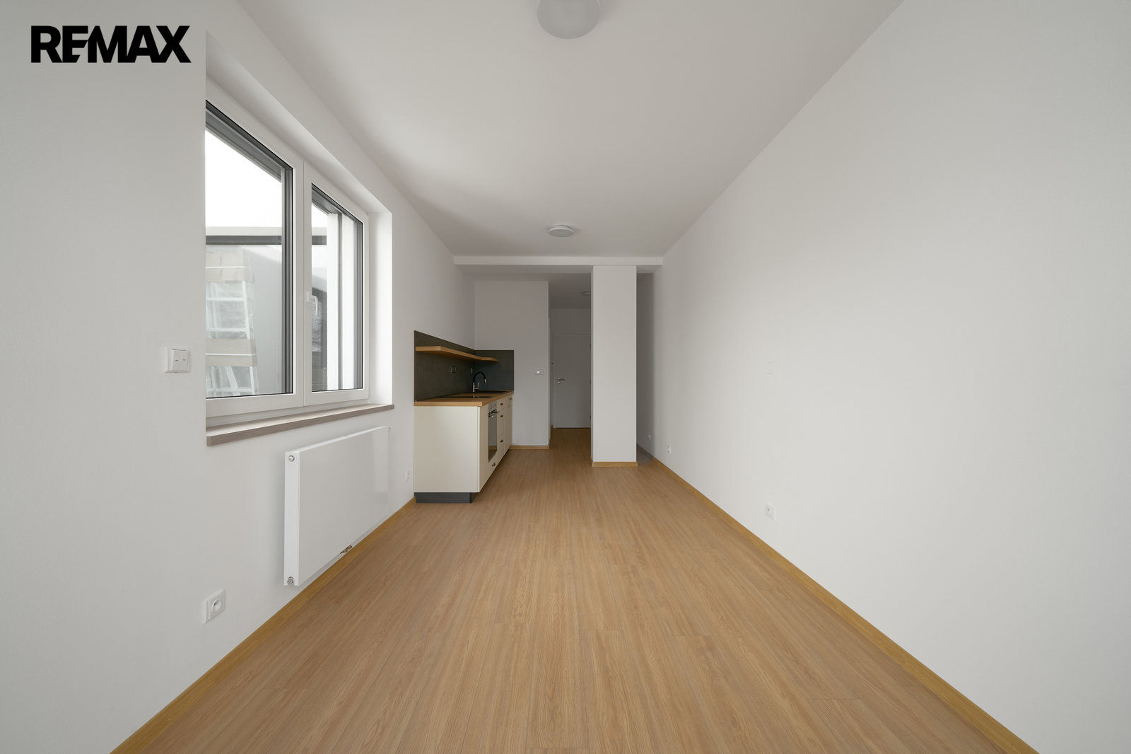 Pokoj s kuchyňským koutem