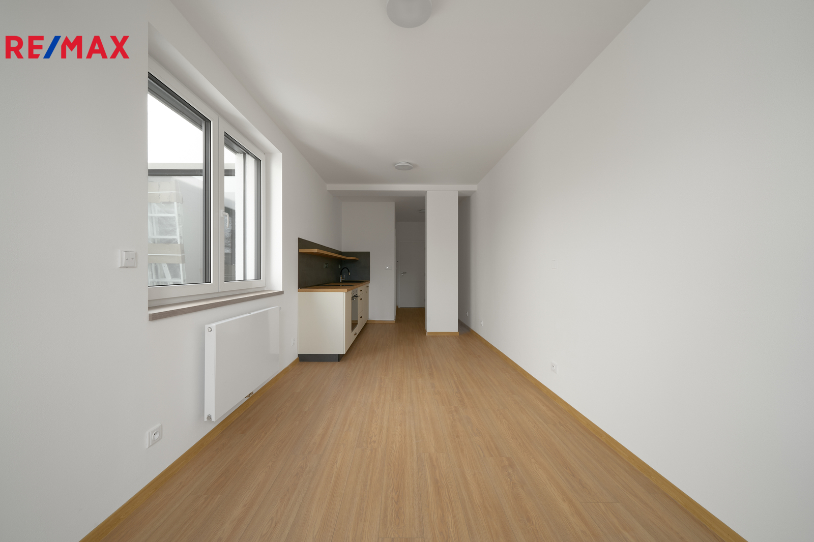 Pokoj s kuchyňským koutem