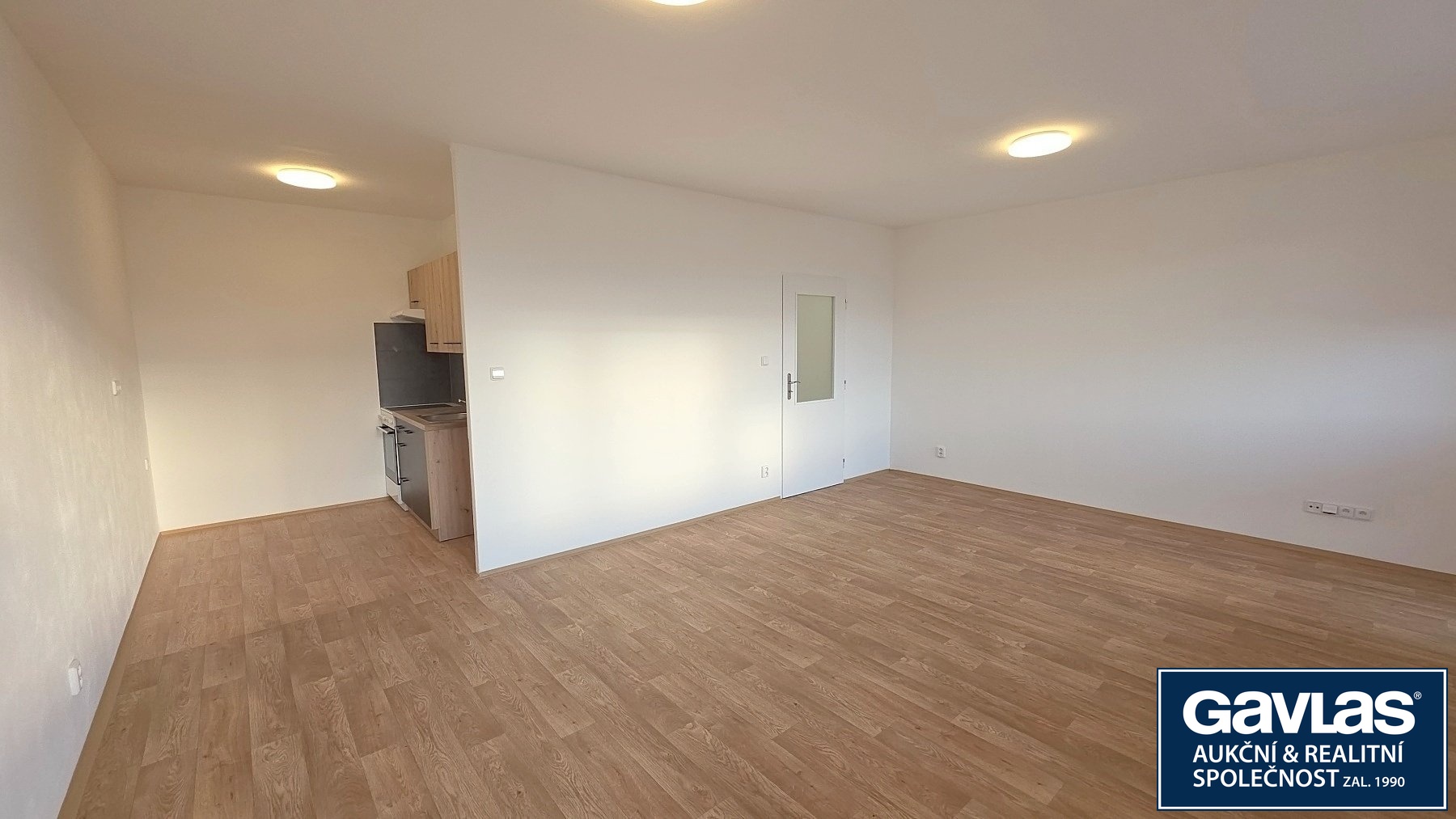 Pokoj s kuchyňským koutem