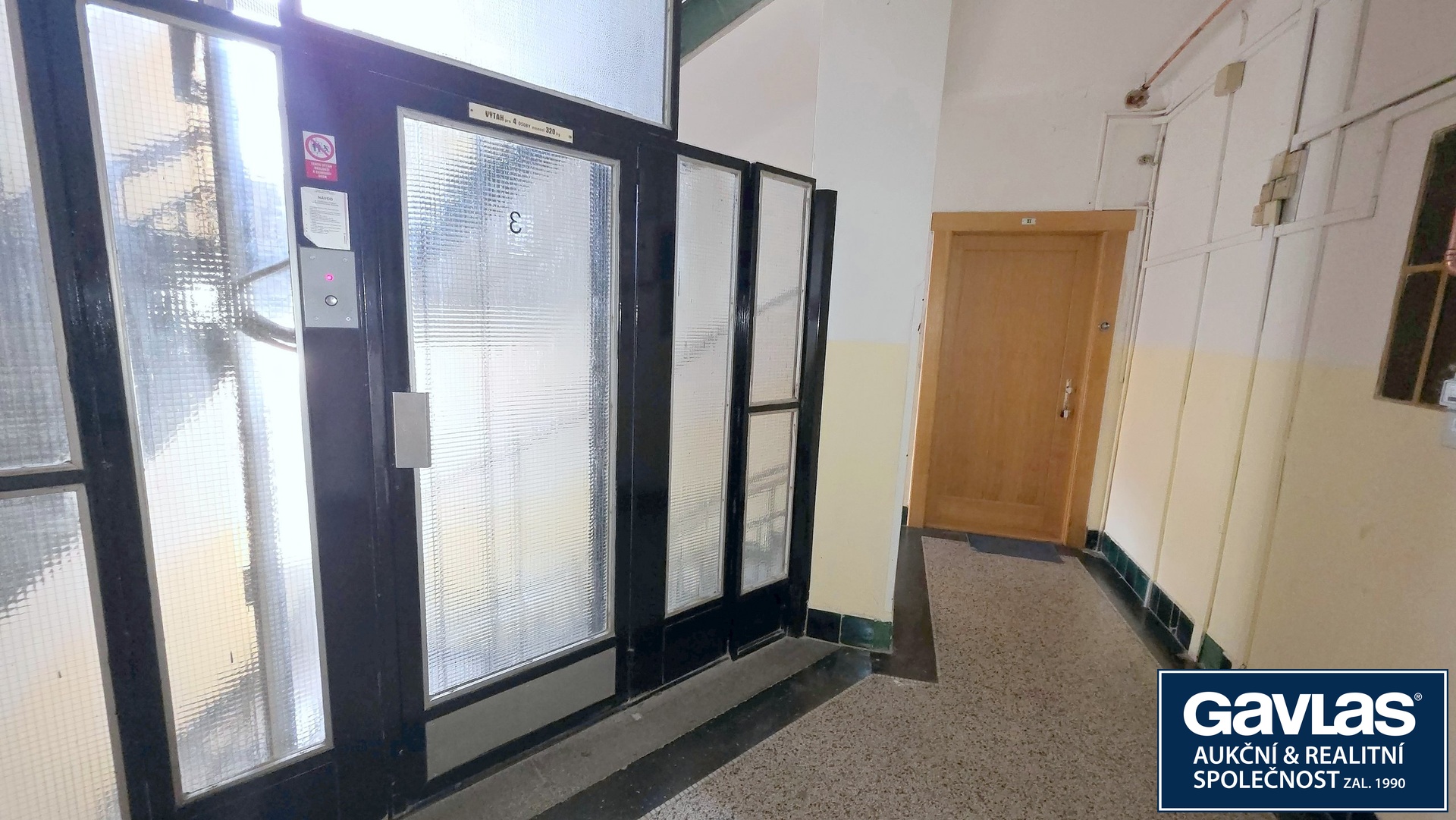 Chodba domu se vstupem do bytu