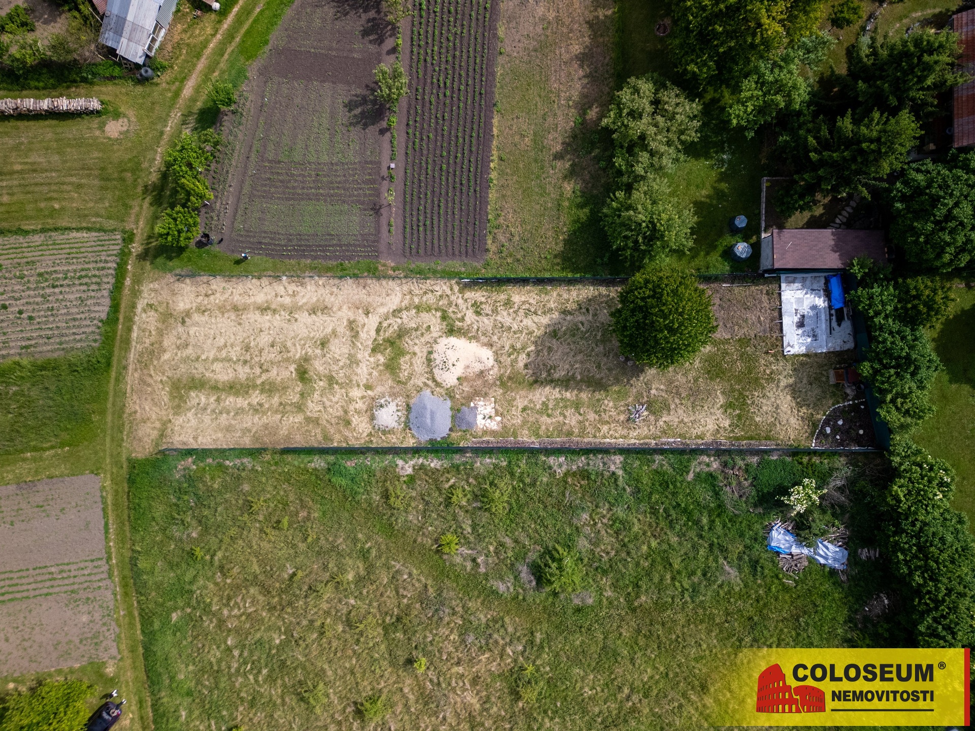 Pohled na pozemek z dronu - Otnice - prodej pozemku pro výstavbu RD