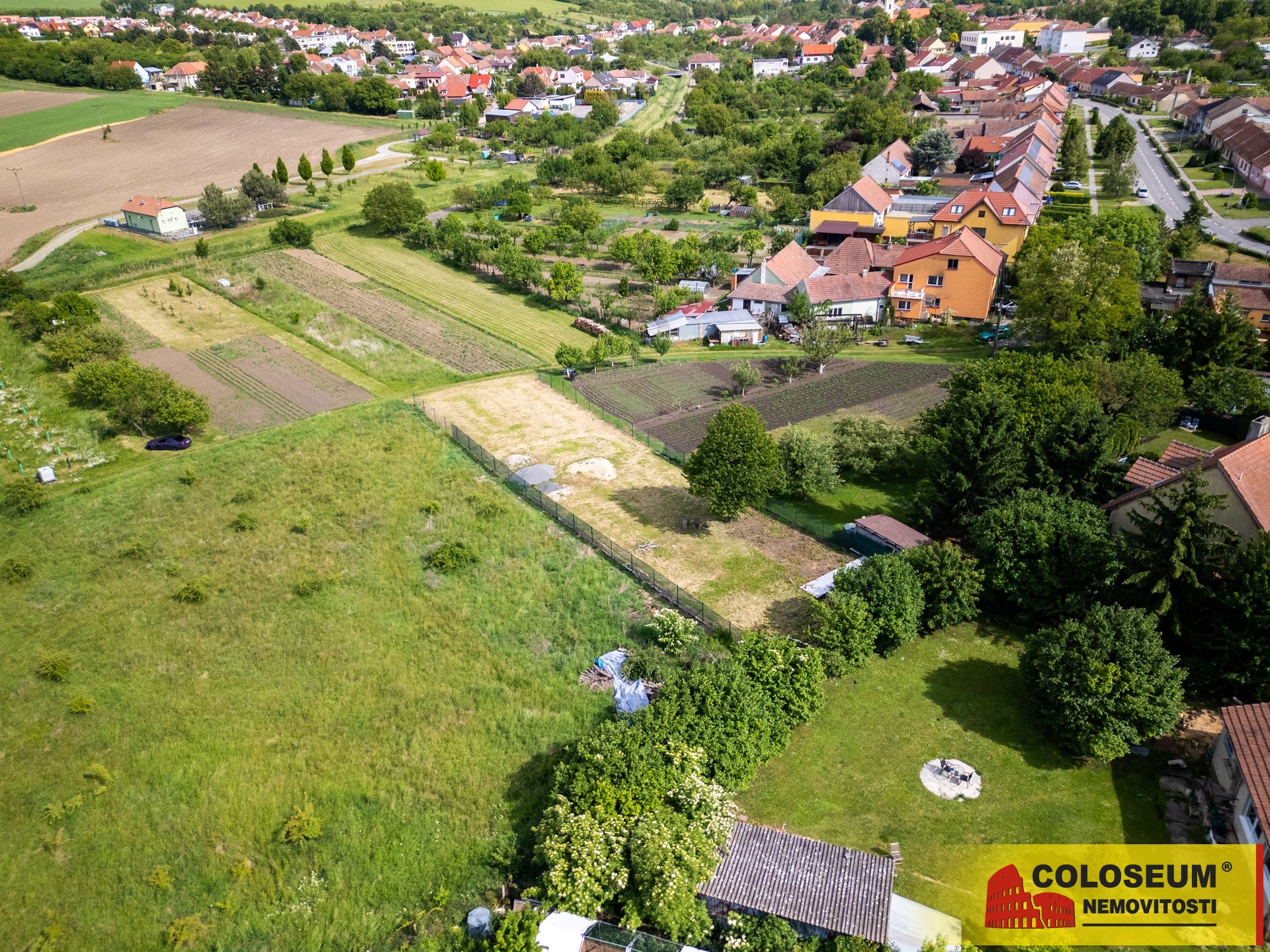 Pohled na pozemek z dronu - Otnice - prodej pozemku pro výstavbu RD
