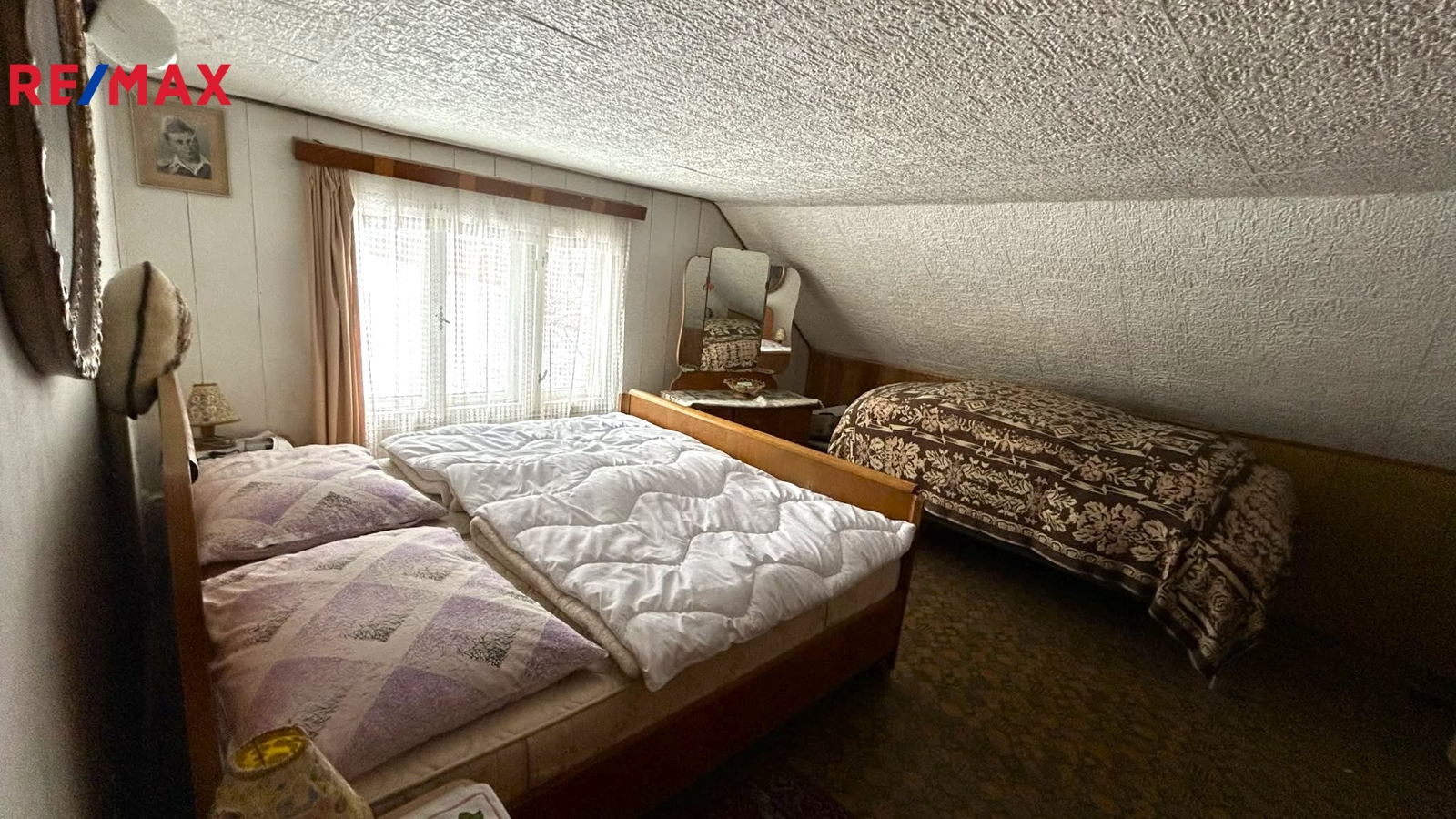 druhá podkrovní místnost