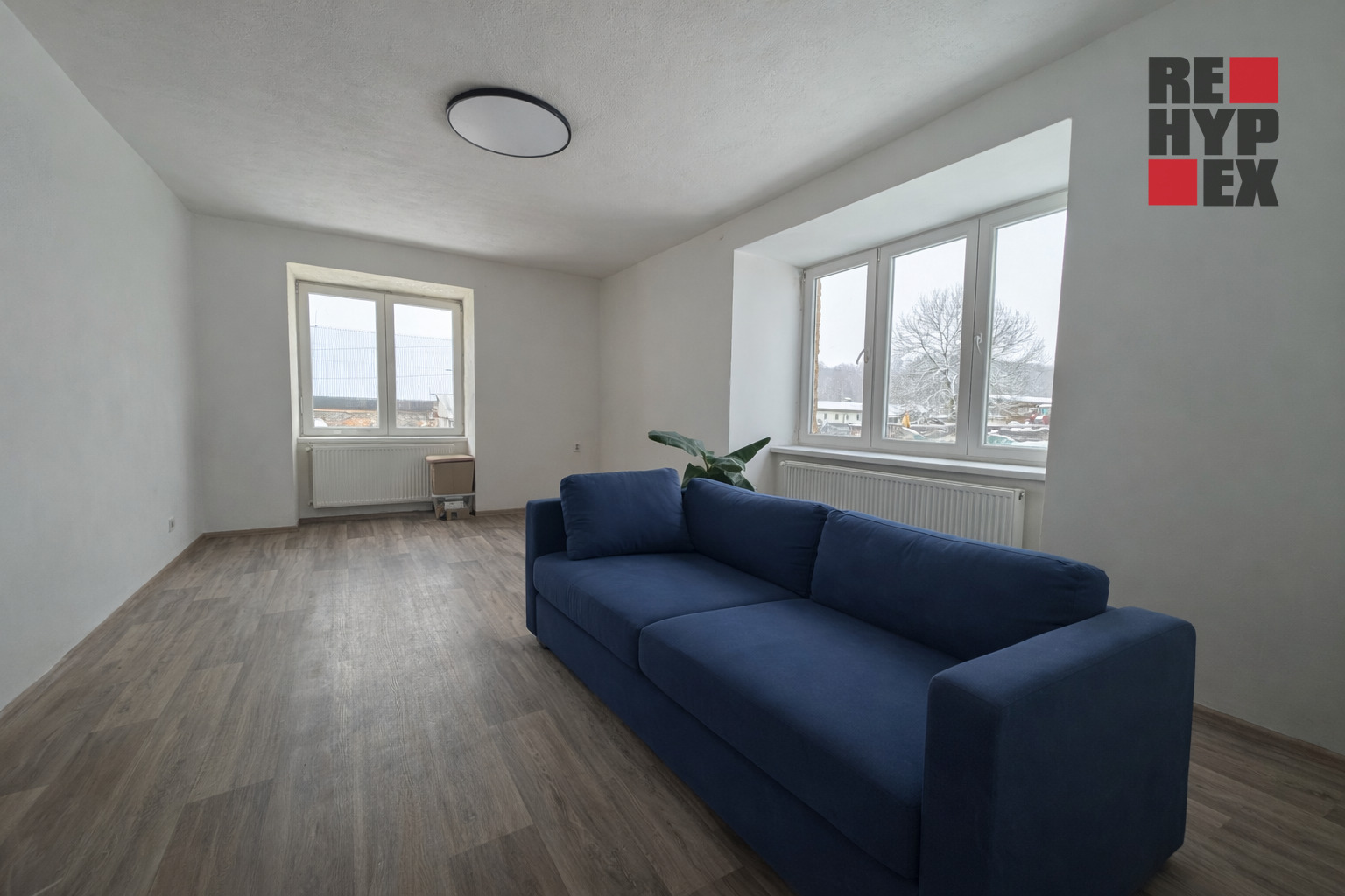 Fotografie pokoje ze které byly smazány osobní věc