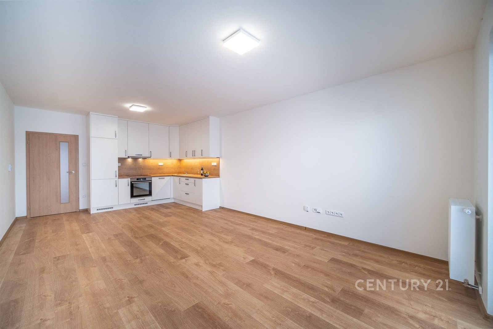 Obývací pokoj s kuchyňským koutem