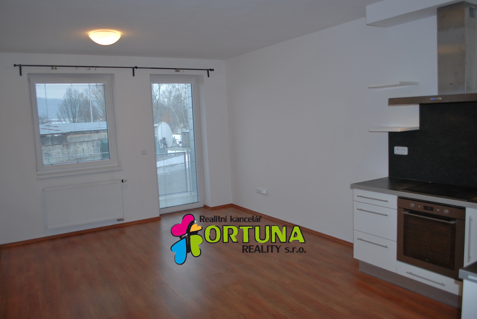 Obývací pokoj s kuch. koutem