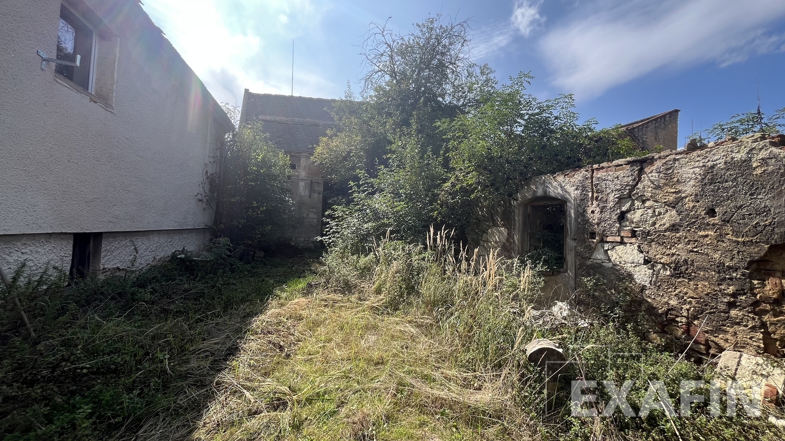 Prodej stavební parcely 1050 m², Měcholupy