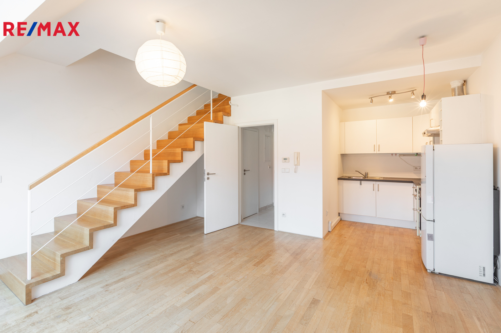 Obývací pokoj s kuchyňským koutem