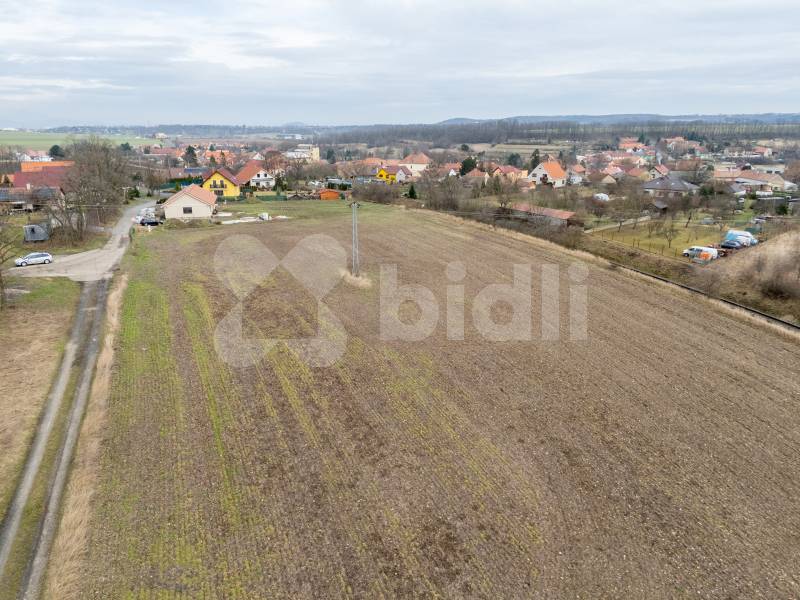 Pozemek Kleneč