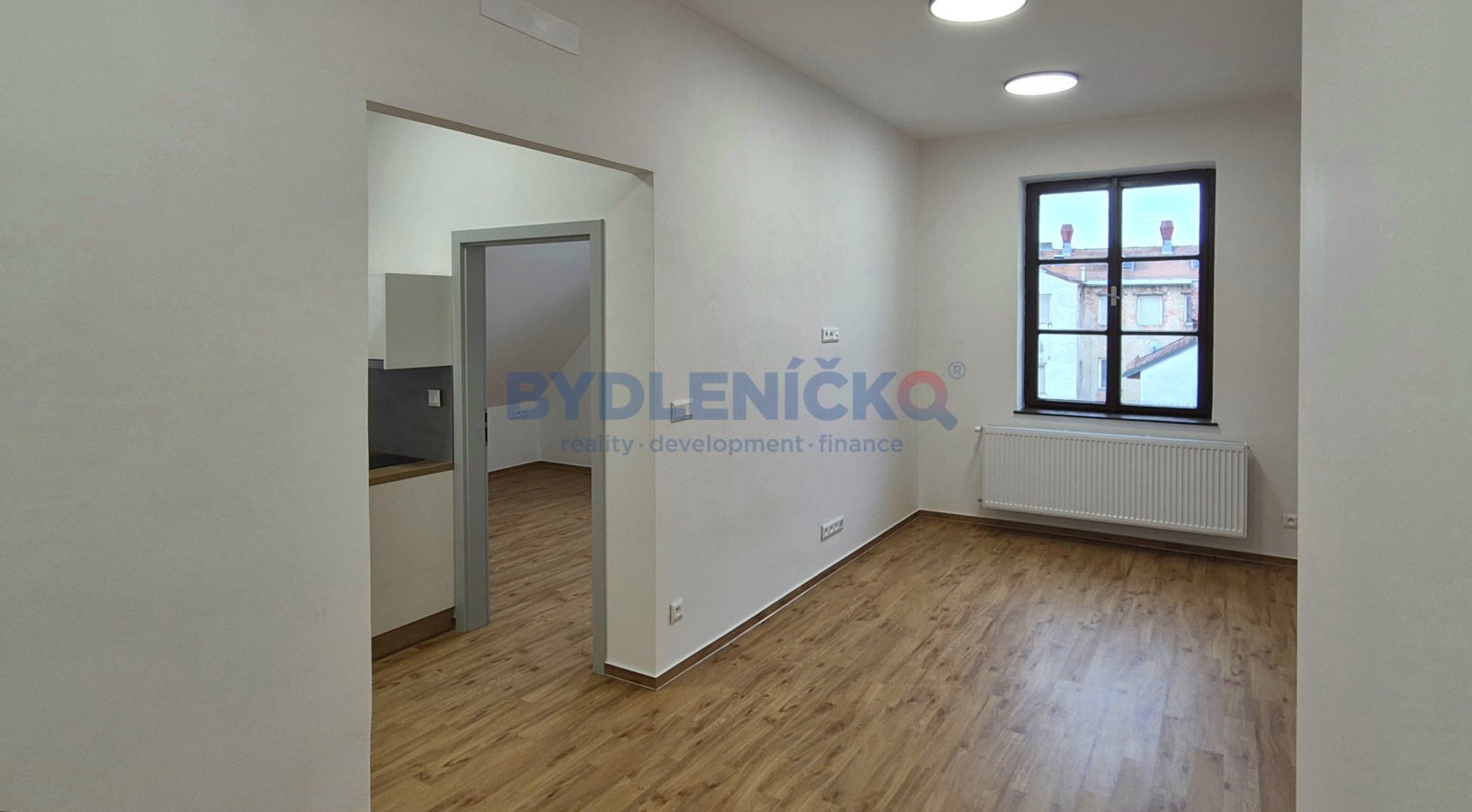 Pronájem podkrovního bytu 2+kk, 64m2, v hist. domě