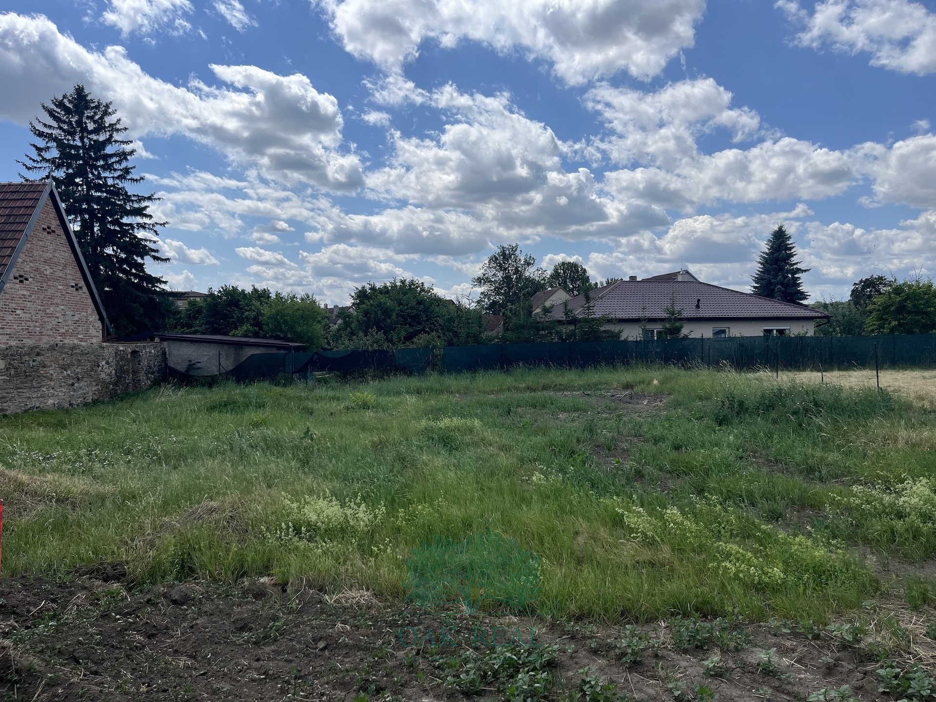 pohled na pozemek ze severni? strany od statku I