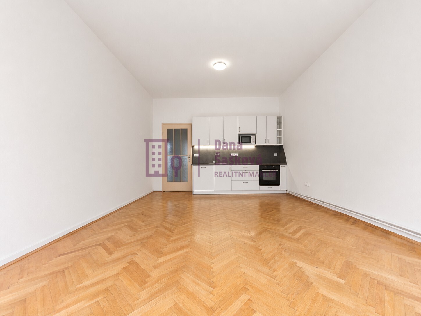 Minimalist modern studio with kitchenette.jpg