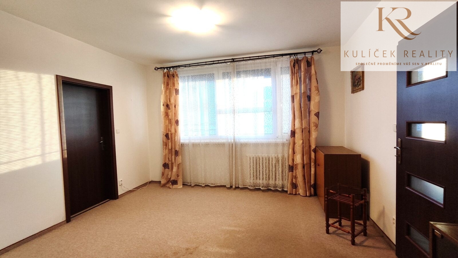 KULÍČEK Reality - Prodej bytu - Obývací pokoj