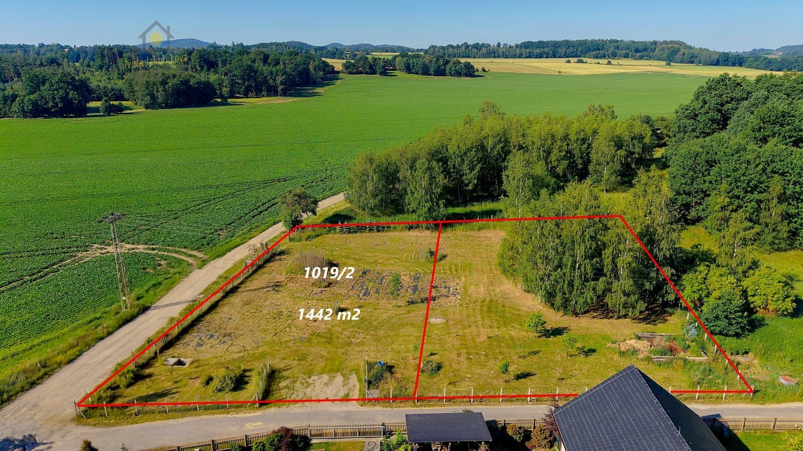 Prodej stavební parcely 1 442 m² – pohled 2