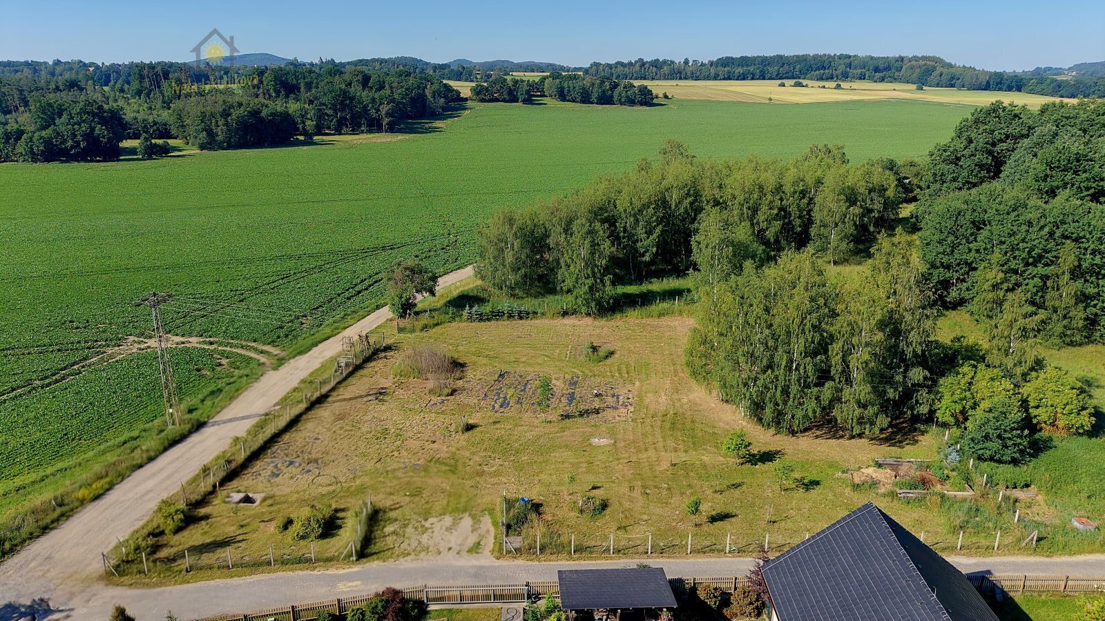 Prodej stavební parcely 1 442 m² – pohled 3