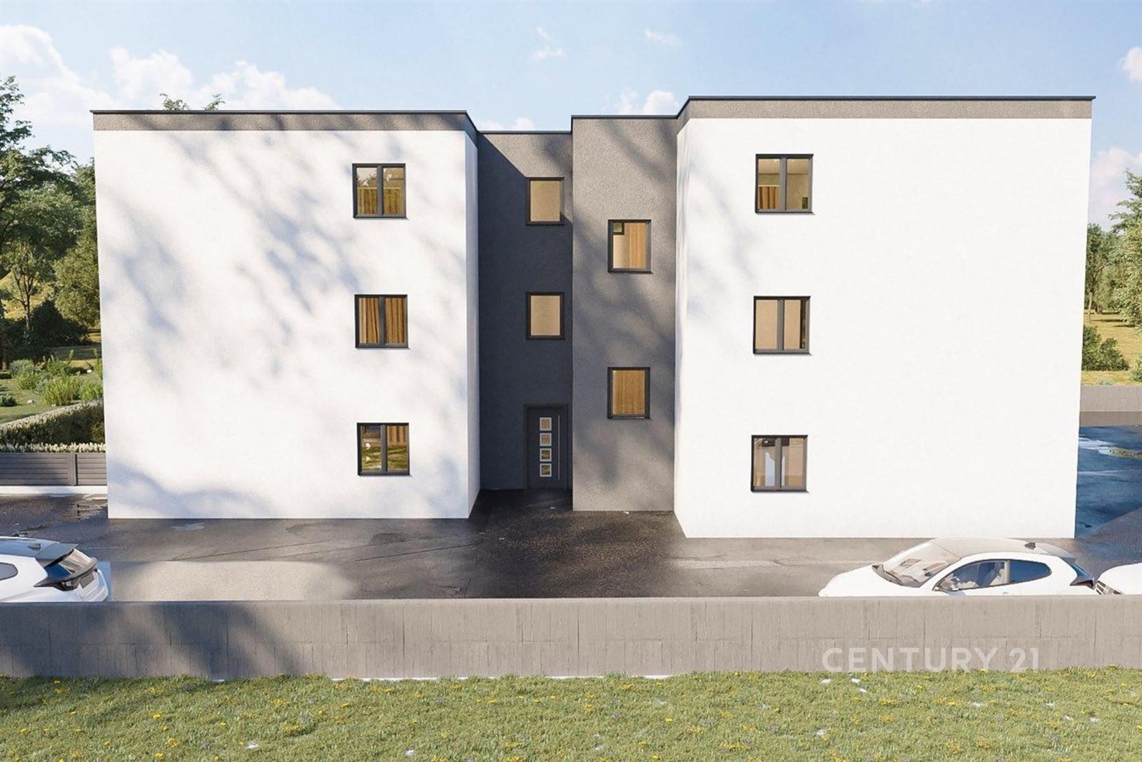 Moderní bytový dům s bílou fasádou, velkými okny a