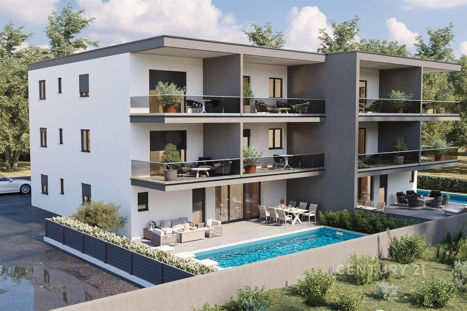 Moderní bytový dům s velkými balkony, bazénem a za