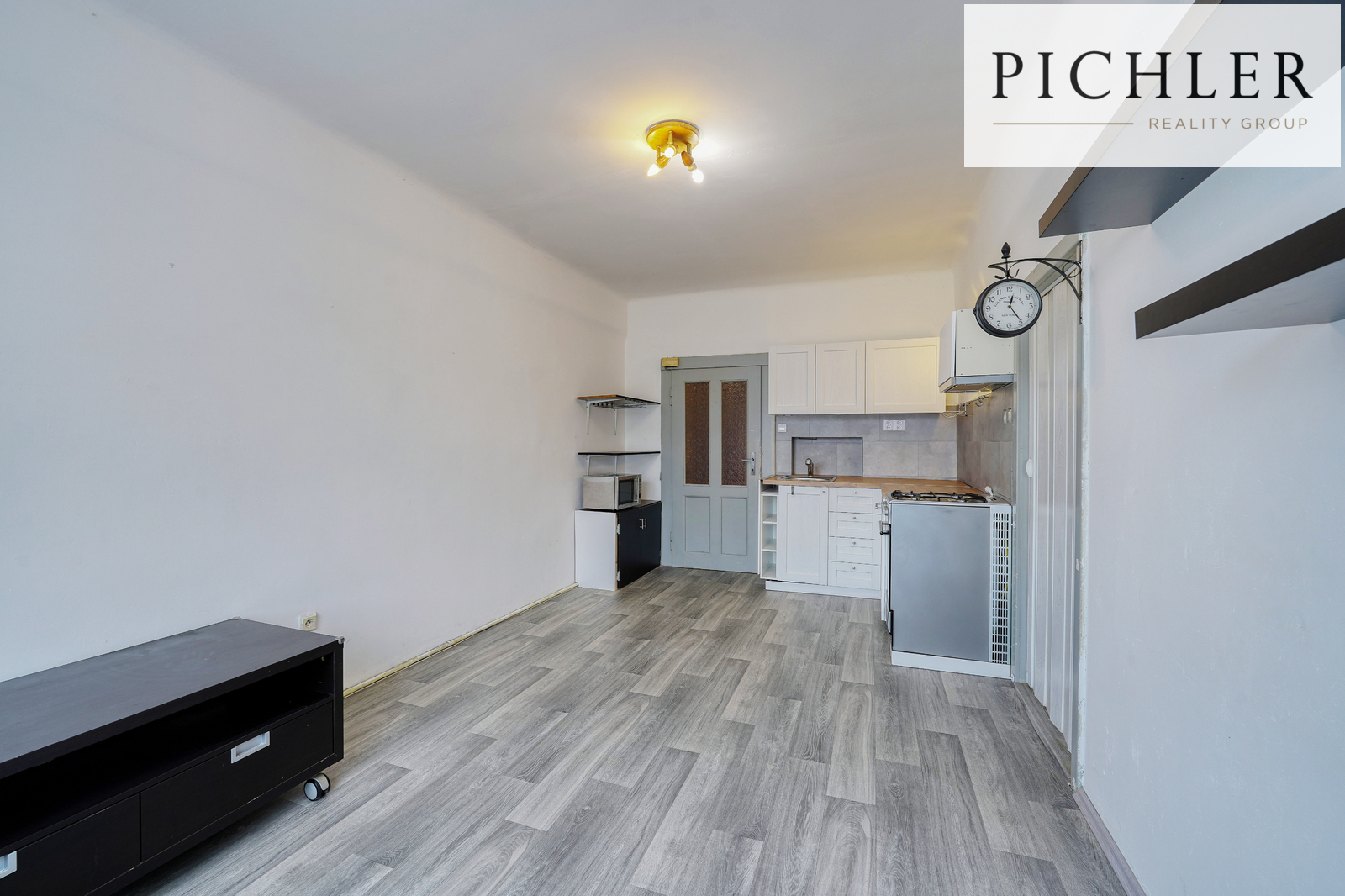 Obývací pokoj s kuchyňským koutem