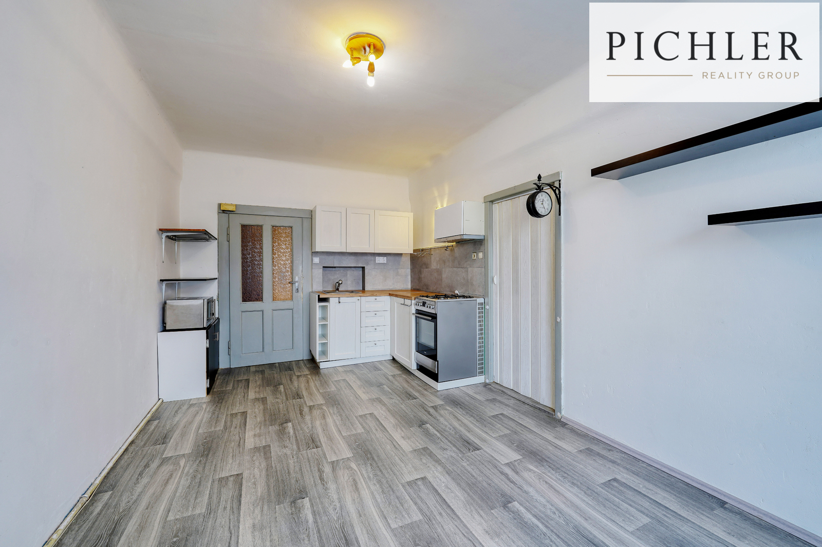 Obývací pokoj s kuchyňským koutem