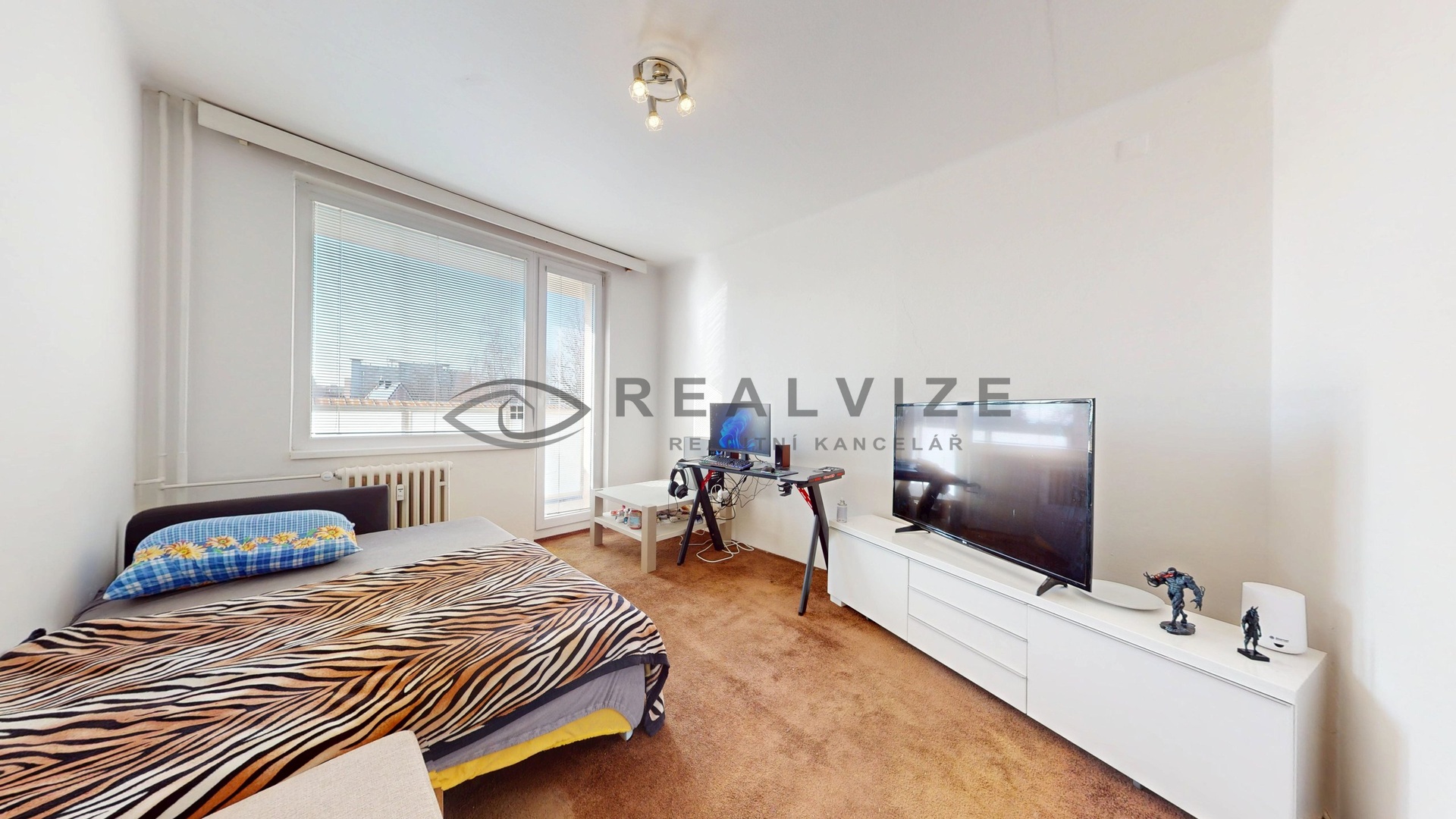 Byt Brožíkova 2+1 obývací pokoj