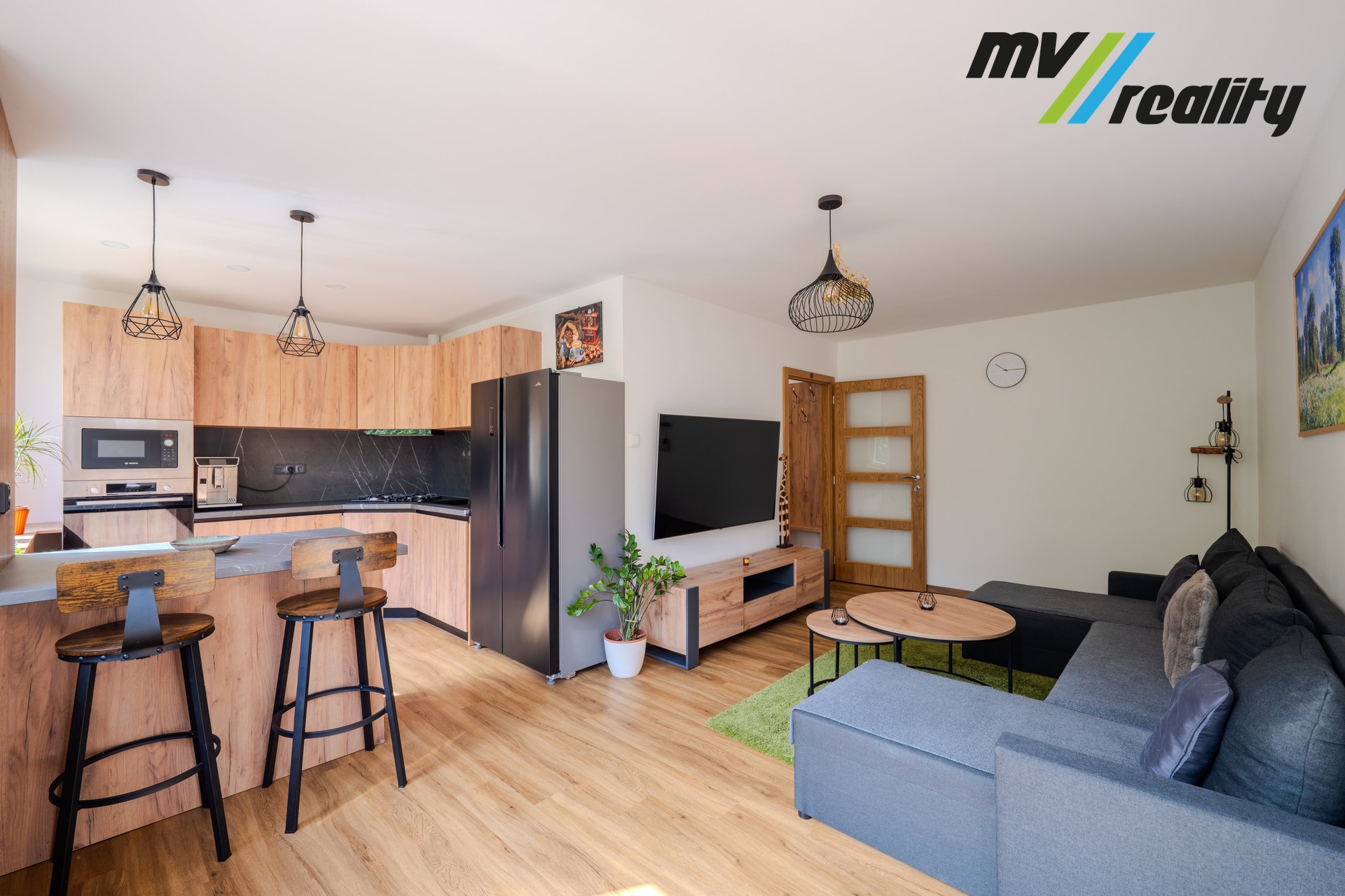 Obývací pokoj a kuchyňský kout