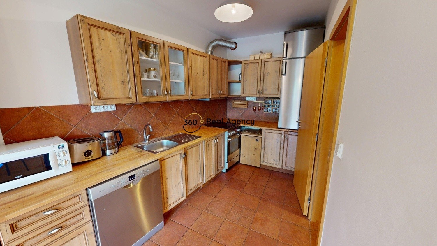 Suchdolske-Namesti-11-byt-2kkterasa-Stepan-Tikovsky-Real-Agency-360-06142025_232251