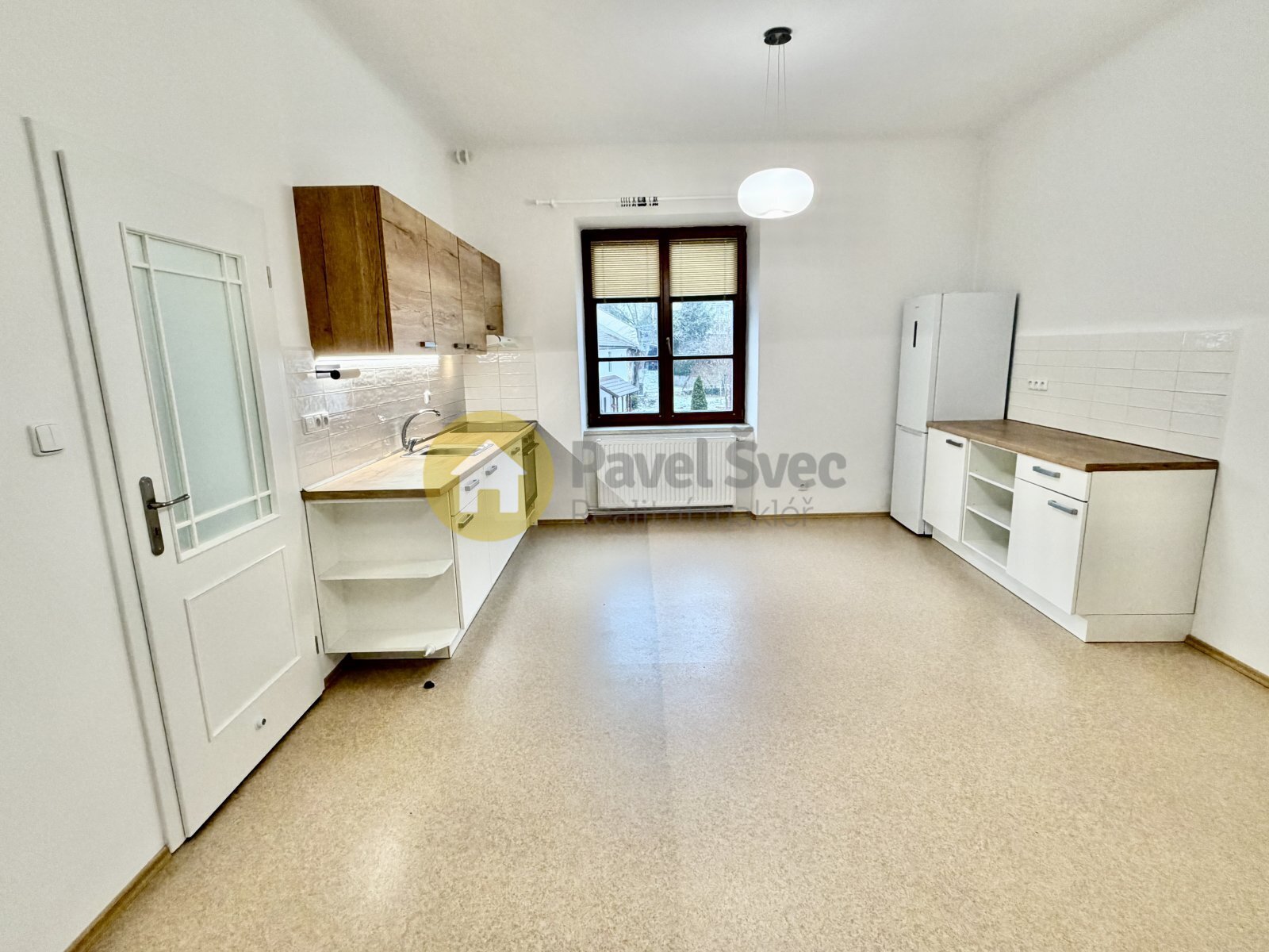 Pokoj s kuchyňským koutem