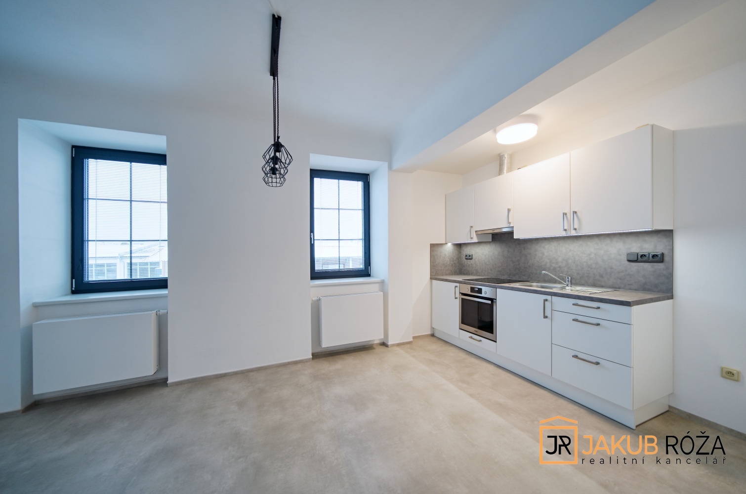 Obývací pokoj s kuchyňským koutem