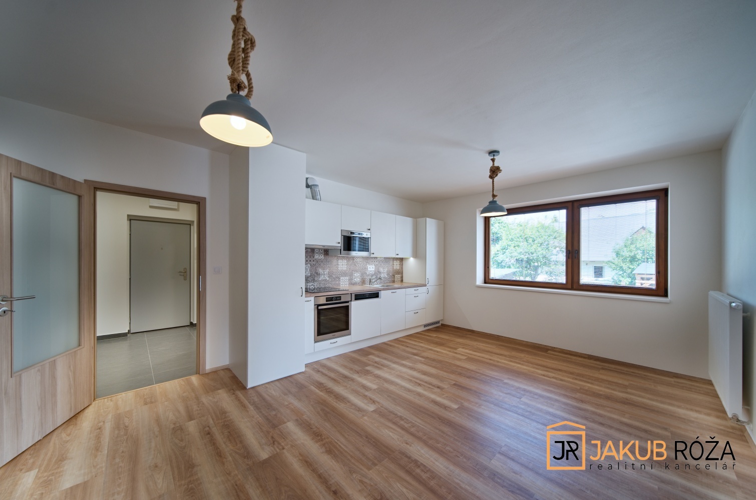 Obývací pokoj s kuchyňským koutem