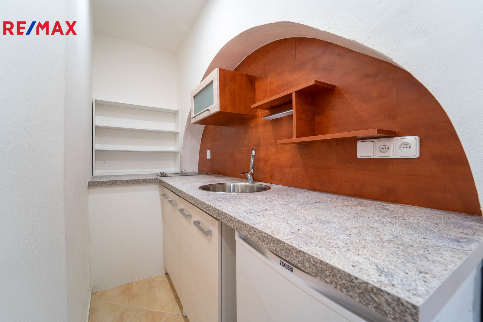 Vybavená kuchyňka v patře