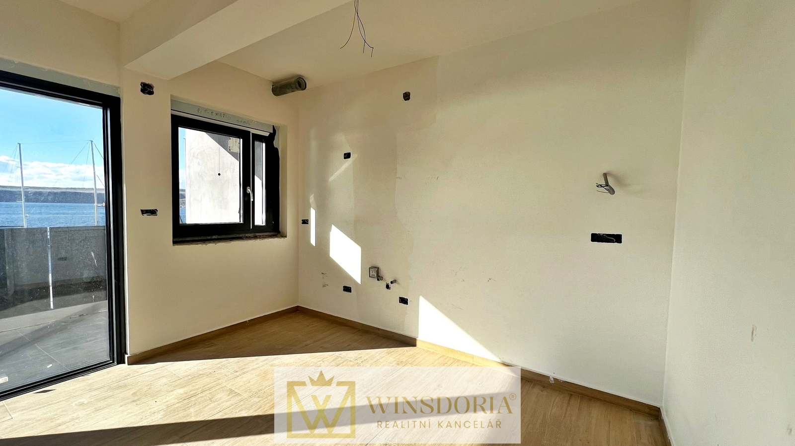 Kuchyňský kout s přímým vstupem na balkon