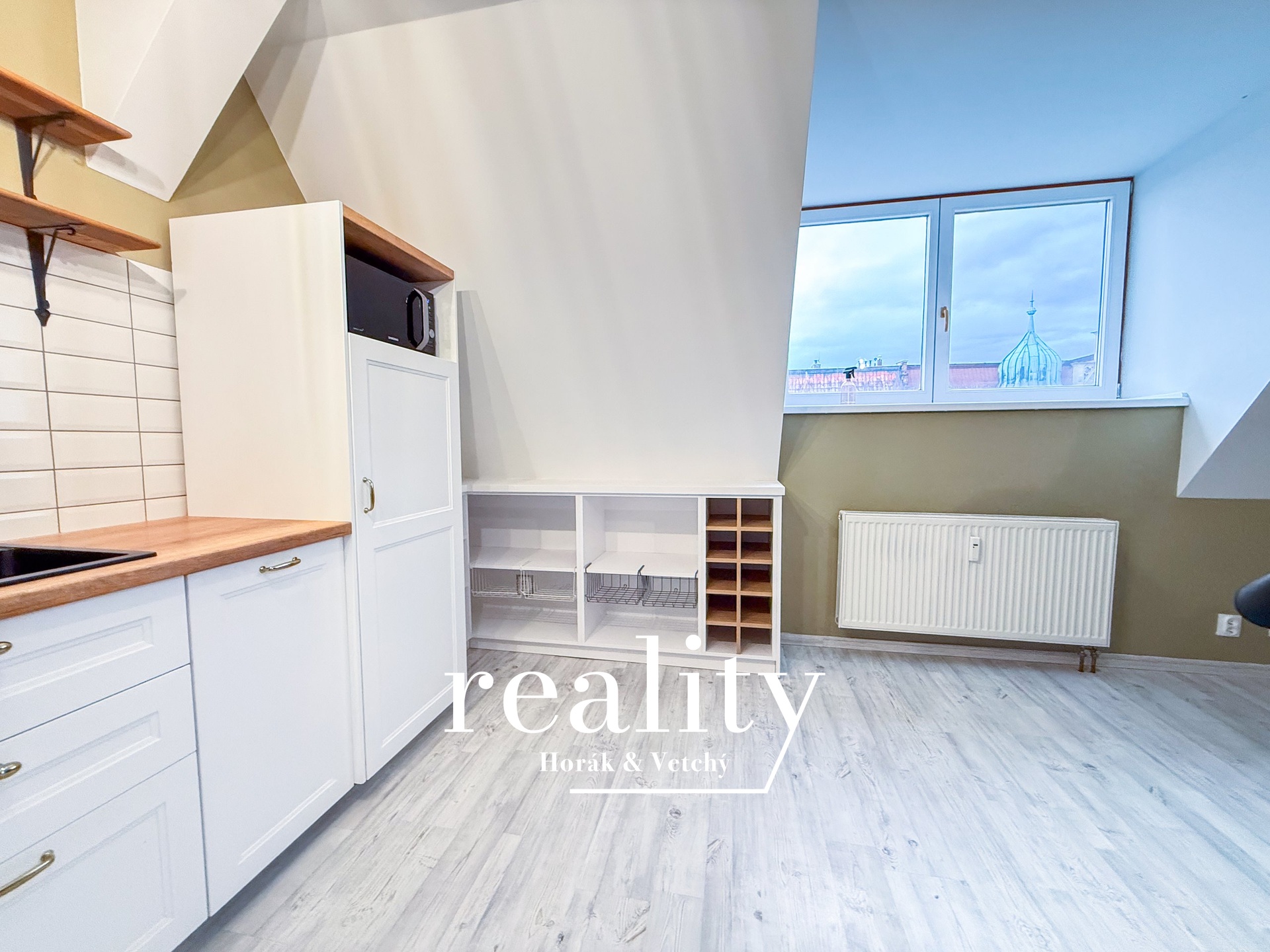 Obývací pokoj s kuchyňským koutem