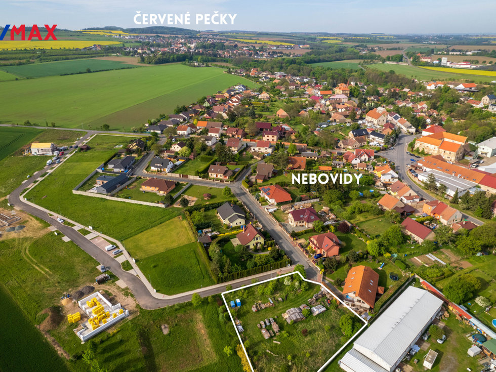 Prodej stavební parcely 1748 m², Nebovidy