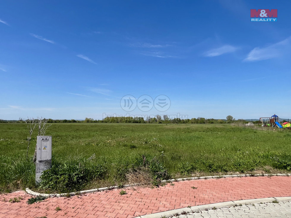 Prodej stavební parcely 966 m², Postoloprty