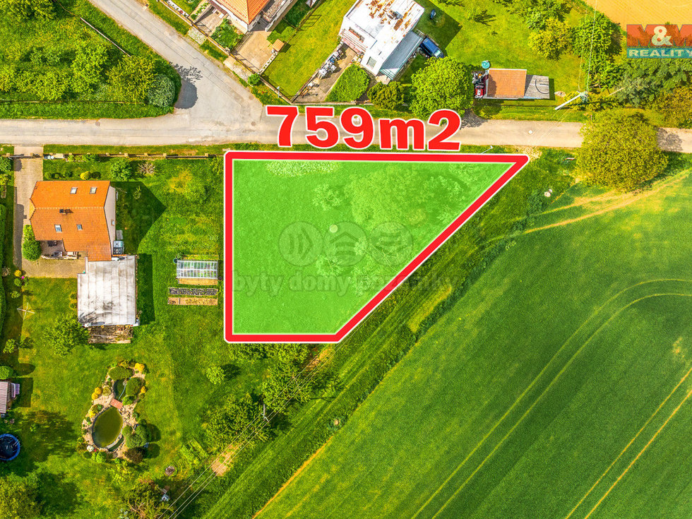 Prodej stavební parcely 759 m², Suchdol