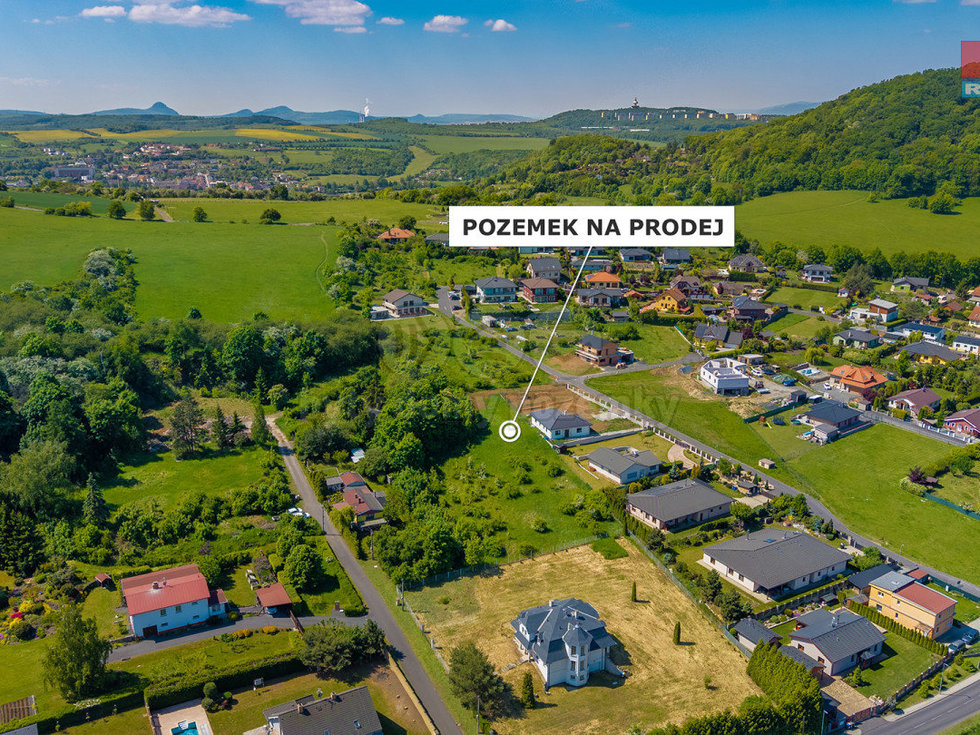 Prodej stavební parcely 1037 m², Modlany